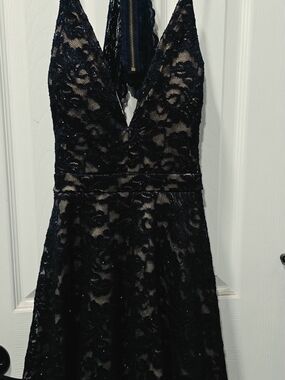 Navy and nude Emerald Sundae dress features a sequined lace overlay